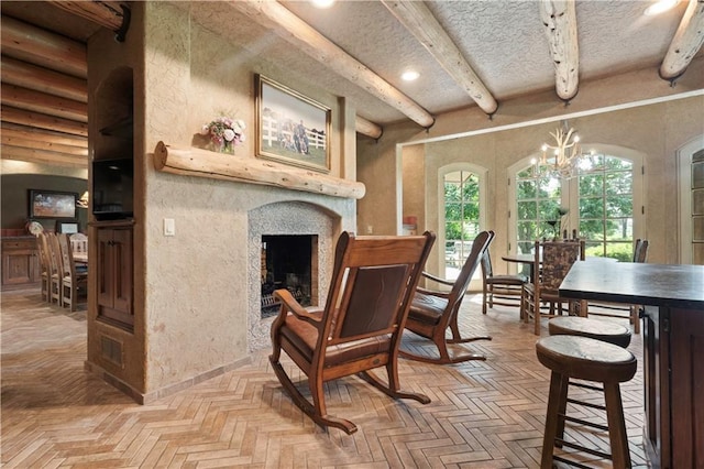 12635 W 183rd St, Overland Park, KS 66013 - sitting room with a chandelier, recessed lighting, beamed ceiling, a fireplace, and a textured wall