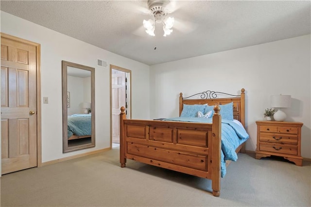 12635 W 183rd St, Overland Park, KS 66013 - carpeted bedroom featuring a ceiling fan and a textured ceiling