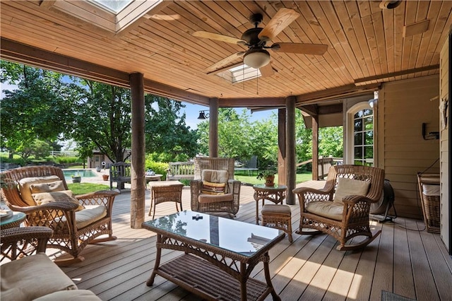 12635 W 183rd St, Overland Park, KS 66013 - wooden terrace with ceiling fan, an outdoor living space, and an outdoor pool