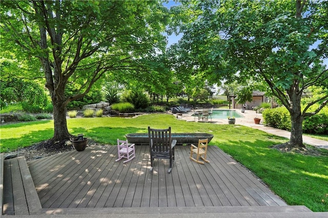 12635 W 183rd St, Overland Park, KS 66013 - wooden terrace with an outdoor pool, an outdoor fire pit, and a yard