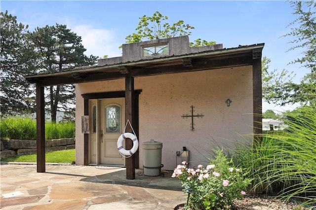 12635 W 183rd St, Overland Park, KS 66013 - entrance to property featuring stucco siding and a patio area