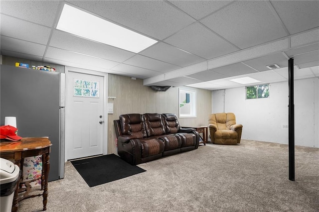 39103 New Lancaster Rd, Lacygne, KS 66040 - carpeted living room featuring a paneled ceiling