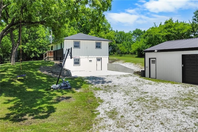 39103 New Lancaster Rd, Lacygne, KS 66040 - back of property with a lawn and an outdoor structure
