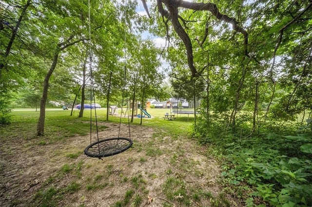 6401 SE Hamilton Rd, Holt, MO 64048 - view of green lawn with a playground