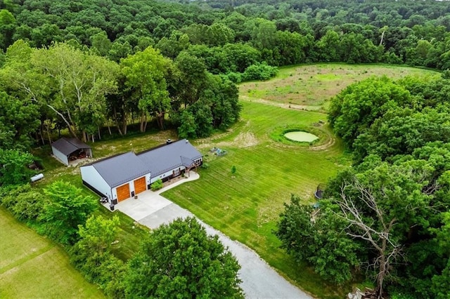 6401 SE Hamilton Rd, Holt, MO 64048 - view from above of property with a forest