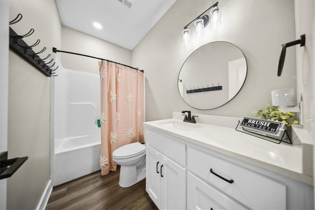 6401 SE Hamilton Rd, Holt, MO 64048 - full bathroom featuring vanity, wood finished floors, and shower / tub combo