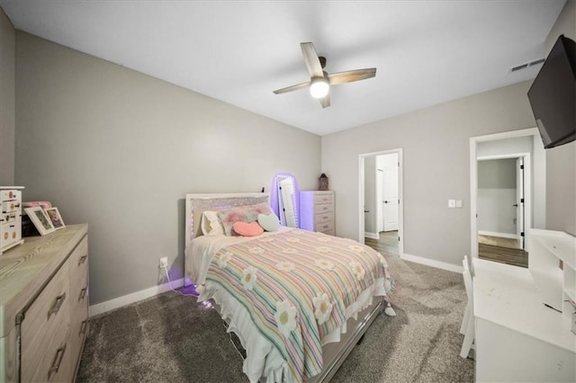 6401 SE Hamilton Rd, Holt, MO 64048 - bedroom with carpet and ceiling fan