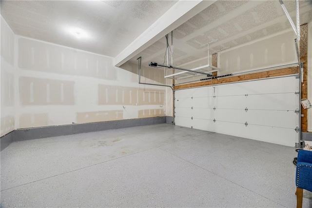 23506 E 10th St S, Independence, MO 64056 - garage featuring a garage door opener