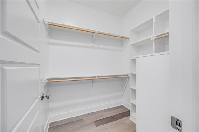 23506 E 10th St S, Independence, MO 64056 - spacious closet with wood finished floors