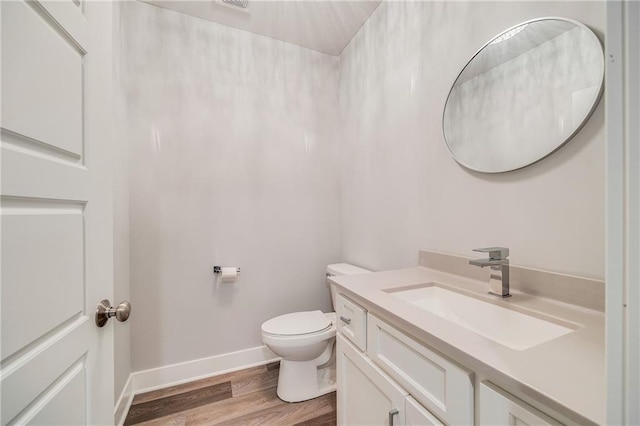 23506 E 10th St S, Independence, MO 64056 - half bathroom with vanity and wood finished floors