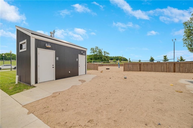 23506 E 10th St S, Independence, MO 64056 - view of yard featuring an outbuilding