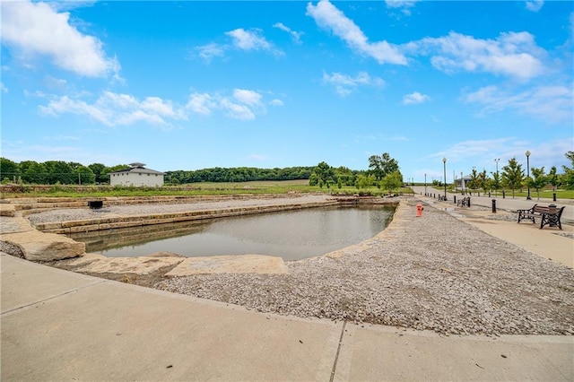 23506 E 10th St S, Independence, MO 64056 - view of pool featuring a water view