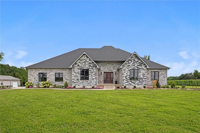 6417 County Road 10508th Rd, Rich Hill, MO 64779 - french country home featuring a front yard, a detached garage, and roof with shingles