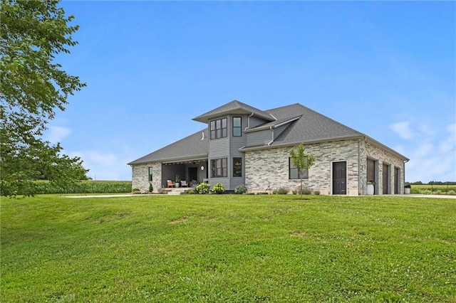 6417 County Road 10508th Rd, Rich Hill, MO 64779 - back of house with a yard and a garage