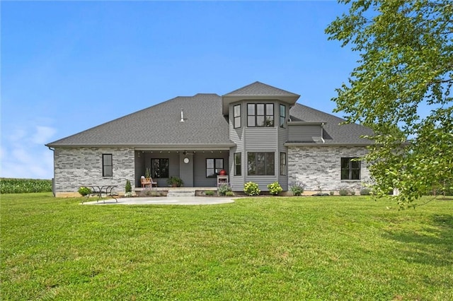 6417 County Road 10508th Rd, Rich Hill, MO 64779 - rear view of house featuring a patio area, a yard, roof with shingles, and brick siding