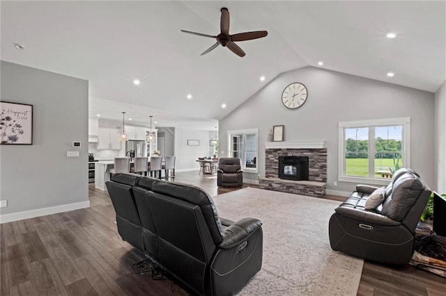 6417 County Road 10508th Rd, Rich Hill, MO 64779 - living room featuring dark wood-style flooring, ceiling fan, recessed lighting, a fireplace, and high vaulted ceiling