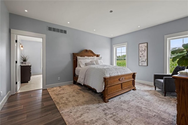 6417 County Road 10508th Rd, Rich Hill, MO 64779 - bedroom featuring dark wood-style flooring and recessed lighting