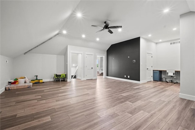 6417 County Road 10508th Rd, Rich Hill, MO 64779 - additional living space featuring a ceiling fan, lofted ceiling, light wood finished floors, built in study area, and recessed lighting