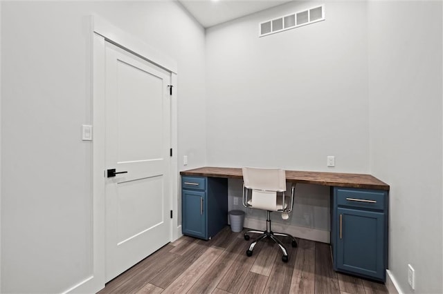 6417 County Road 10508th Rd, Rich Hill, MO 64779 - office space with built in desk and wood finished floors