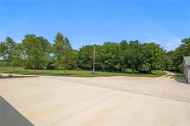 6417 County Road 10508th Rd, Rich Hill, MO 64779 - view of community with a yard and view of scattered trees
