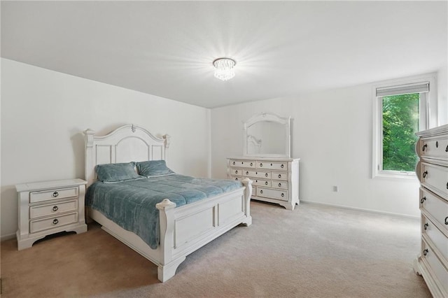 6112 N Mattox Rd, Kansas City, MO 64151 - bedroom featuring light colored carpet and baseboards
