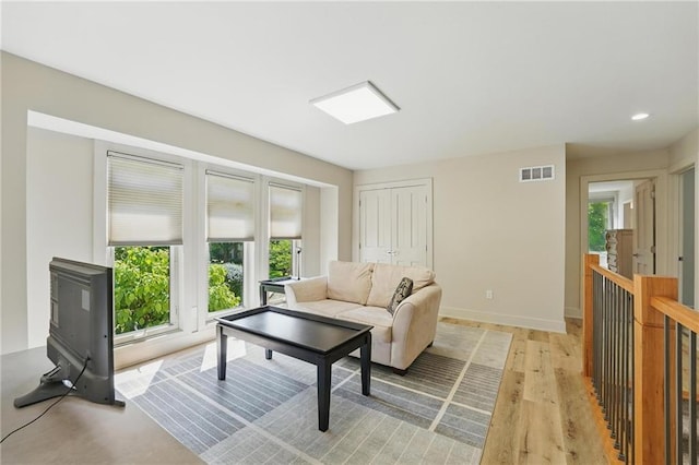 6112 N Mattox Rd, Kansas City, MO 64151 - living area with plenty of natural light, light wood-style flooring, and recessed lighting