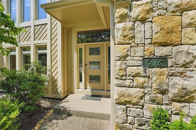 6112 N Mattox Rd, Kansas City, MO 64151 - entrance to property featuring stone siding
