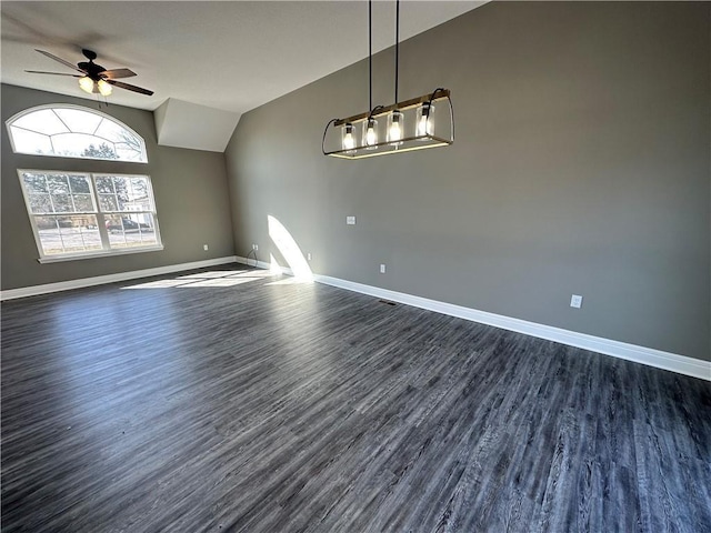 318 NE 51st Rd, Warrensburg, MO 64093 - unfurnished room featuring dark wood finished floors, ceiling fan, and vaulted ceiling