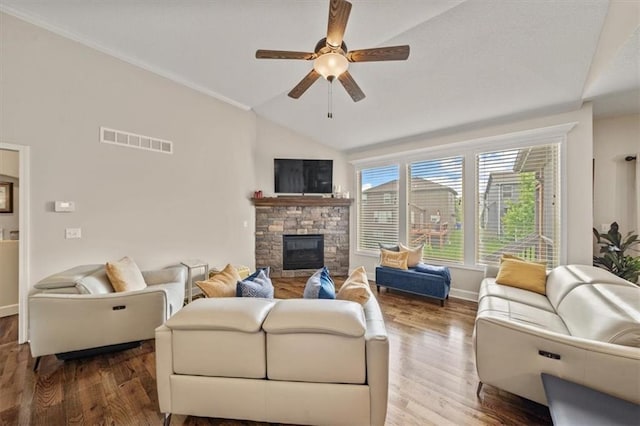 18783 W 165th St, Olathe, KS 66062 - living area with vaulted ceiling, a ceiling fan, wood finished floors, and a stone fireplace