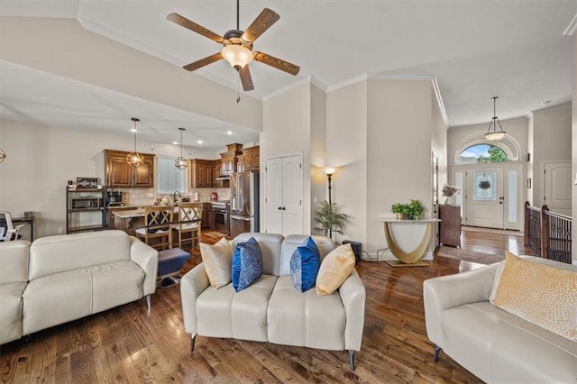 18783 W 165th St, Olathe, KS 66062 - living area featuring a ceiling fan, dark wood-type flooring, crown molding, and recessed lighting