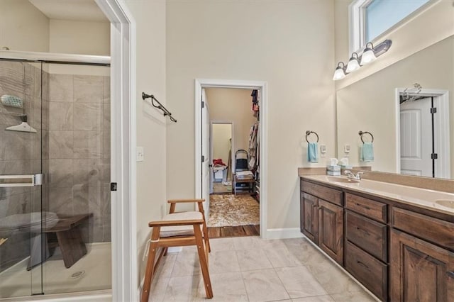 18783 W 165th St, Olathe, KS 66062 - full bath featuring double vanity, a stall shower, and marble look tile flooring