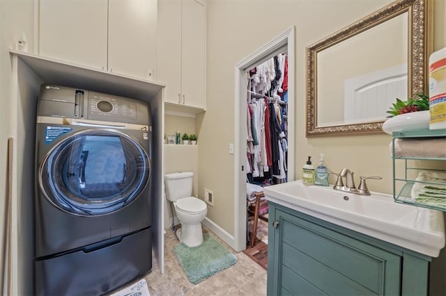 18783 W 165th St, Olathe, KS 66062 - bathroom featuring washer / clothes dryer and vanity