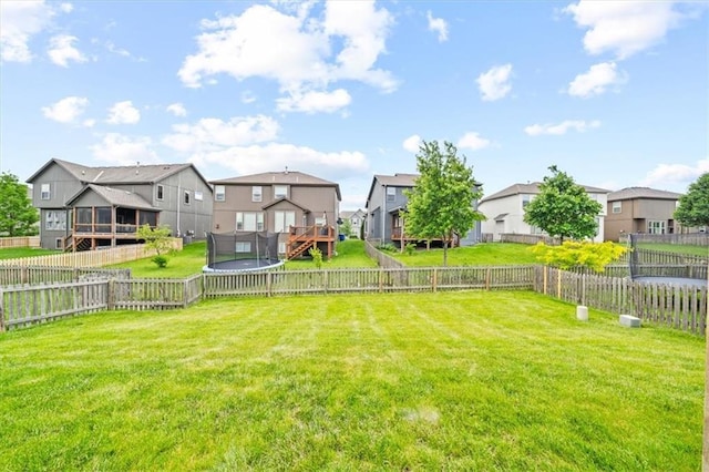 18783 W 165th St, Olathe, KS 66062 - fenced backyard with a residential view and a trampoline