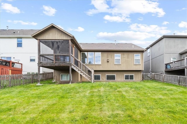 18783 W 165th St, Olathe, KS 66062 - back of house with a sunroom, stairs, a fenced backyard, and a shingled roof