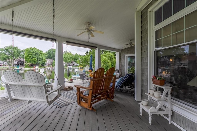 11 Dockside Dr, Lake Tapawingo, MO 64015 - wooden terrace with a ceiling fan and a water view