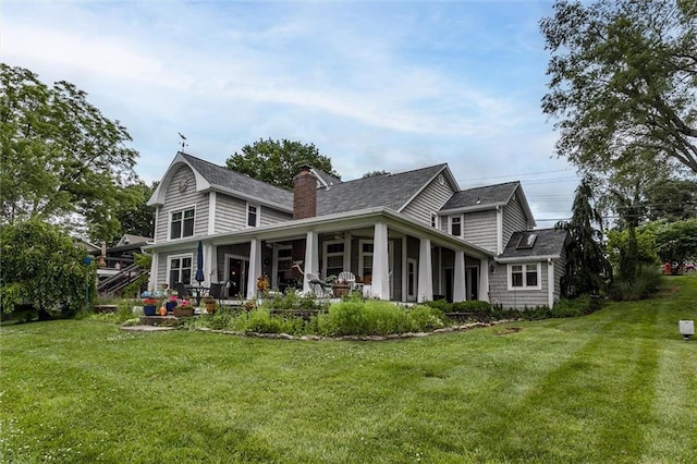 11 Dockside Dr, Lake Tapawingo, MO 64015 - back of property with a lawn, a chimney, roof with shingles, and a sunroom