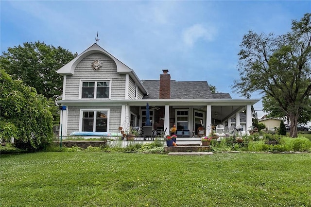 11 Dockside Dr, Lake Tapawingo, MO 64015 - back of property with a yard and a chimney