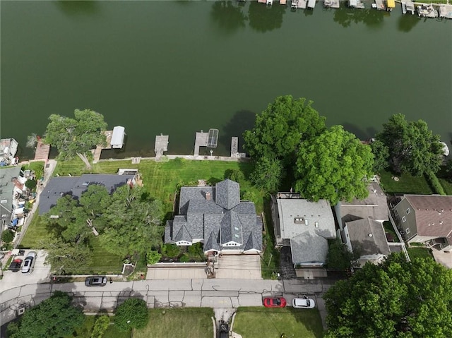 11 Dockside Dr, Lake Tapawingo, MO 64015 - aerial view of property and surrounding area featuring a large body of water and nearby suburban area