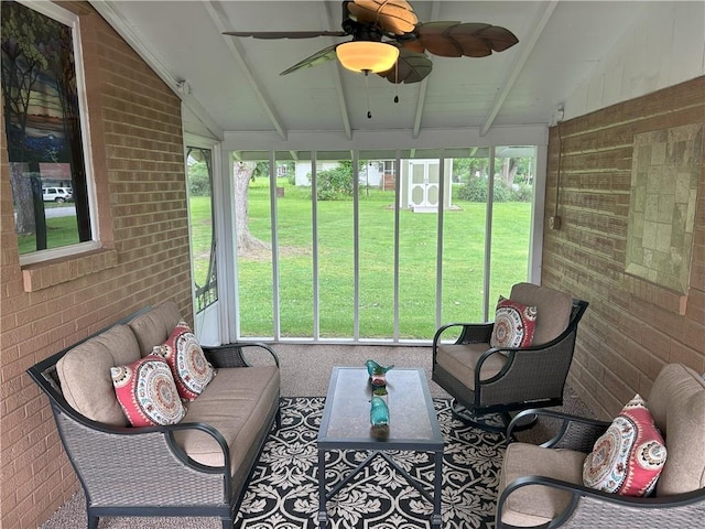 1047 N Lynn St, Nevada, MO 64772 - sunroom / solarium with ceiling fan and an outdoor hangout area