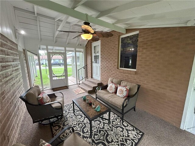 1047 N Lynn St, Nevada, MO 64772 - sunroom featuring an outdoor hangout area and ceiling fan