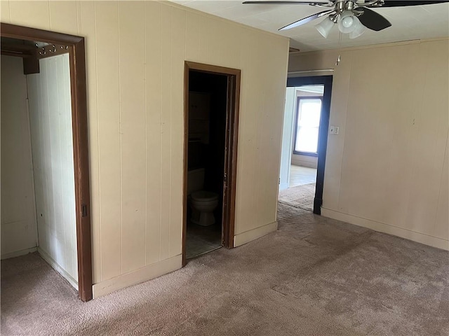 229 E Bates St, Drexel, MO 64742 - spare room with carpet floors and a ceiling fan