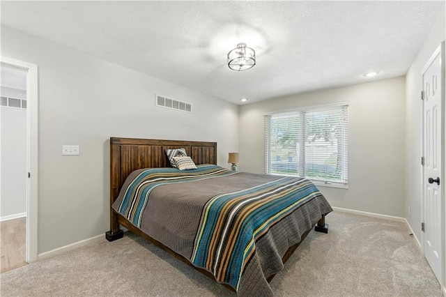 503 Amesbury Dr, Smithville, MO 64089 - bedroom with carpet flooring and a textured ceiling