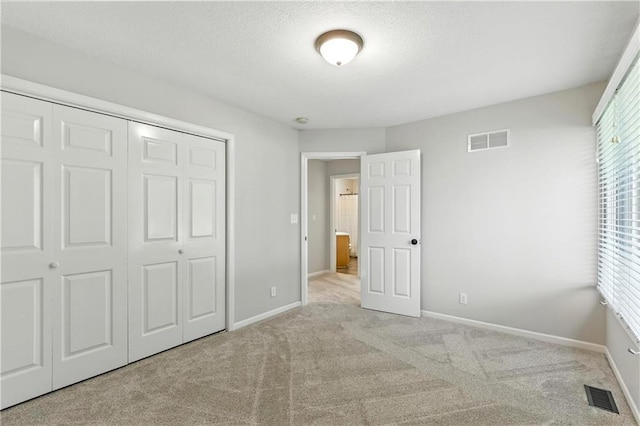 503 Amesbury Dr, Smithville, MO 64089 - unfurnished bedroom with carpet flooring and a closet