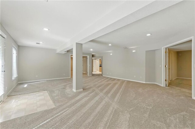 503 Amesbury Dr, Smithville, MO 64089 - basement with light colored carpet and recessed lighting