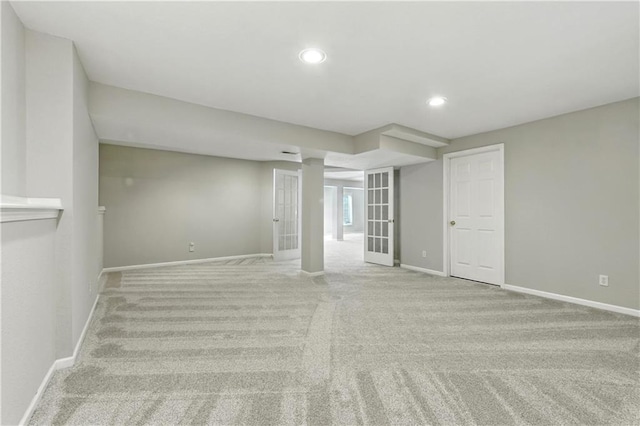 503 Amesbury Dr, Smithville, MO 64089 - carpeted empty room featuring recessed lighting and french doors