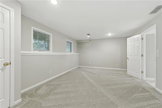 503 Amesbury Dr, Smithville, MO 64089 - carpeted empty room with recessed lighting