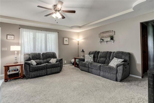 2450 Labette Rd, Ottawa, KS 66067 - carpeted living area with ceiling fan and baseboards
