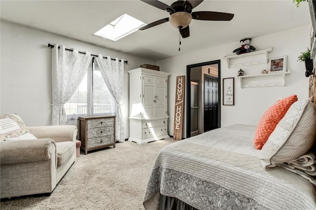 2450 Labette Rd, Ottawa, KS 66067 - carpeted bedroom featuring a skylight and ceiling fan