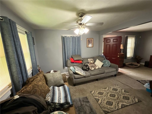 2122 S Scott Ave, Independence, MO 64052 - living area featuring carpet, healthy amount of natural light, and a ceiling fan