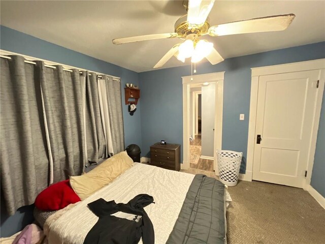 2122 S Scott Ave, Independence, MO 64052 - bedroom with carpet flooring and a ceiling fan